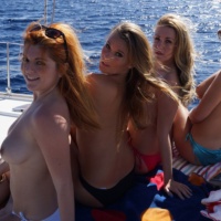 Topless Girls On A Boat